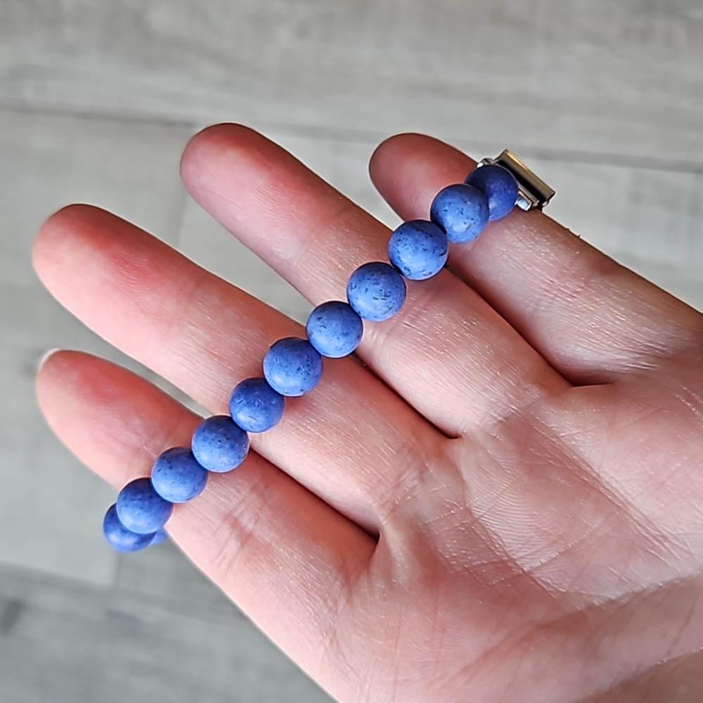 Blue Bead KEEP Collective Bracelet with Cross and 2 accent charms.